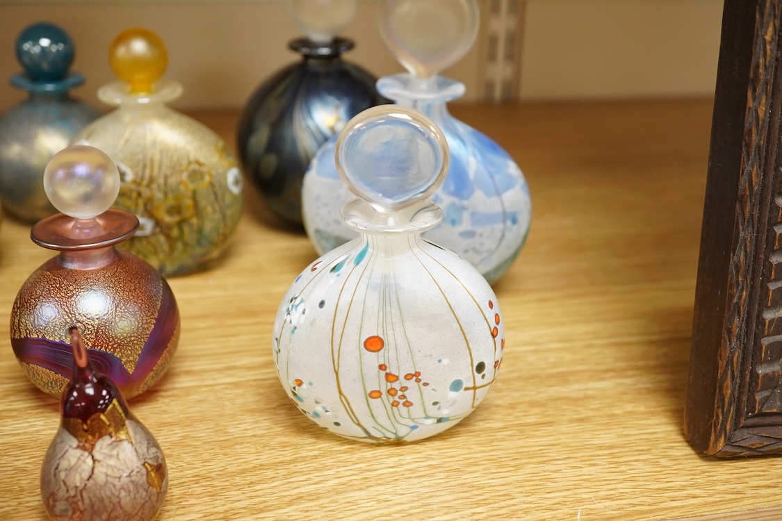 Eleven Isle of Wight studio glass scent bottles and stoppers and a similar apple and pear shaped studio paperweight, tallest scent bottle 13cm high